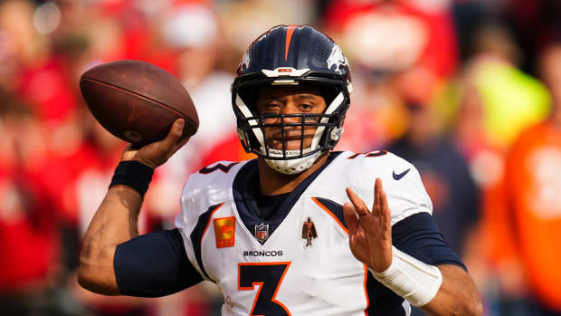 Jan 1, 2023; Kansas City, Missouri, USA; Denver Broncos quarterback Russell Wilson (3) throws a pass during the first half against the Kansas City Chiefs at GEHA Field at Arrowhead Stadium.